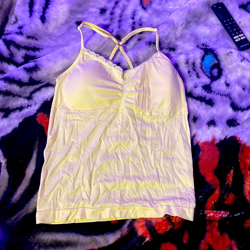 “No Boundaries” padded light yellow racer back tank top with lace